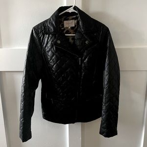 Black jacket with leopard lining. size small